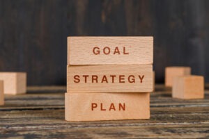 business-marketing-concept-with-wooden-blocks-wooden-table-side-view